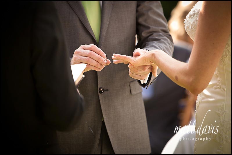 Ring exchange at Barnsley House outdoor ceremony